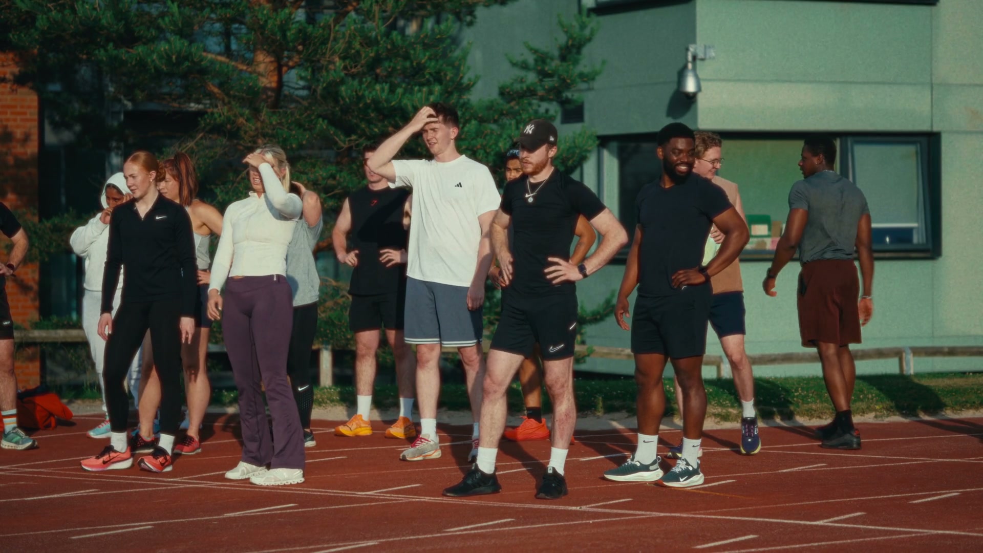 The club lined up along the track at golden hour